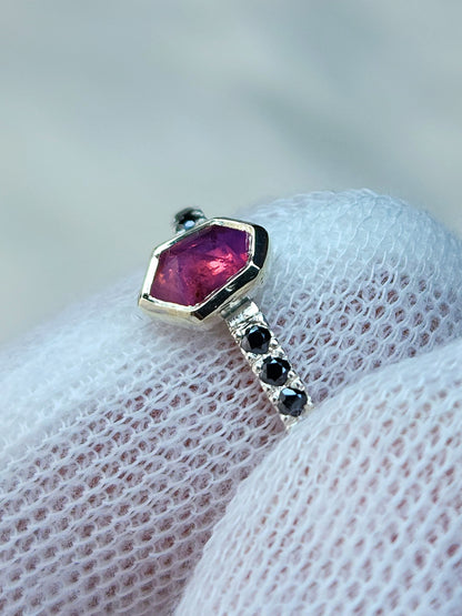 Opalescent pink sapphire shield winza sapphire sterling silver ring with 12-1.5 mm pave set black moissanites in a 10 karat yellow gold bezel