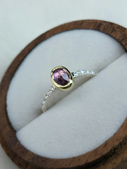 Oval pastel pink winza sapphire,14 karat yellow gold bezel, sterling silver ring, pave setting white moissanite