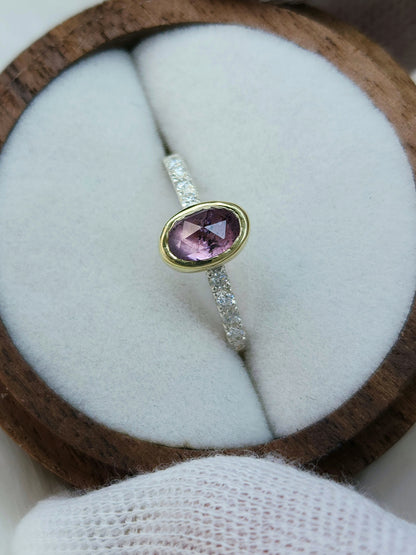 Oval pastel pink winza sapphire,14 karat yellow gold bezel, sterling silver ring, pave setting white moissanite